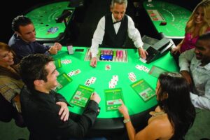 People playing Blackjack at a Zytronic technology interactive casino table