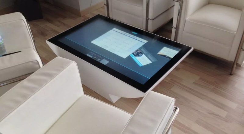 A ZYBRID touch sensor implemented onto a touch window interactive table