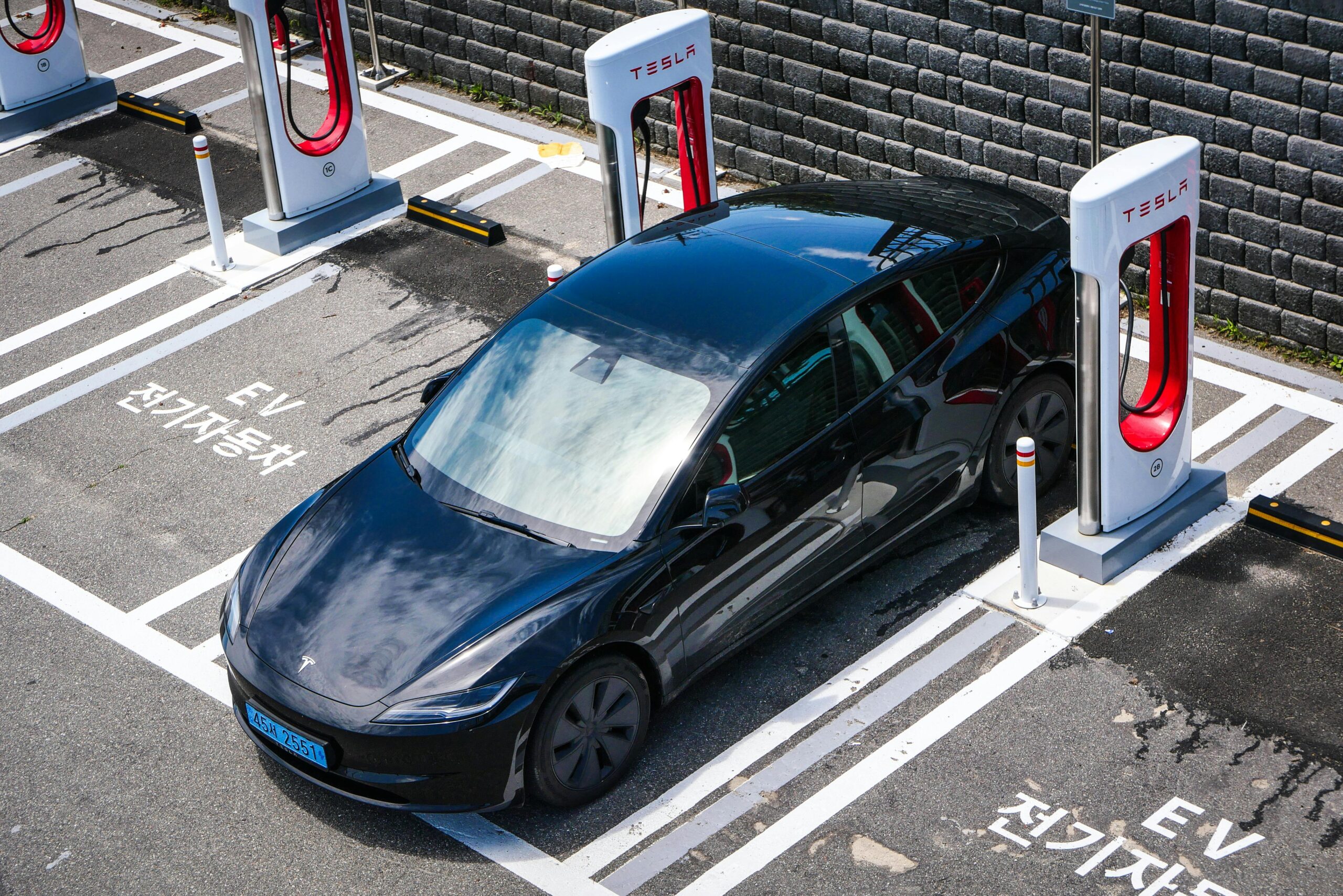 An electric car at an EV charging point
